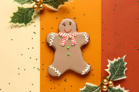Christmas sweet gingerbread cookie with beautiful decorations and confetti on colorful background