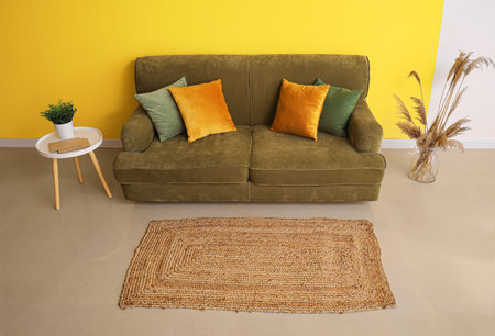 Interior of modern room with green sofaの写真素材