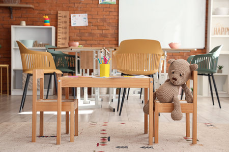 Table with art supplies in kindergartenの写真素材