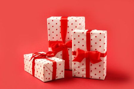 Christmas gift boxes on red background