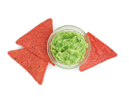 Red nachos and tasty guacamole on white backgroundの写真素材