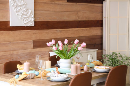 Interior of festive decorated dining room with Easter table setting