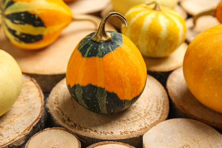 Fresh pumpkins on wooden backgroundの写真素材