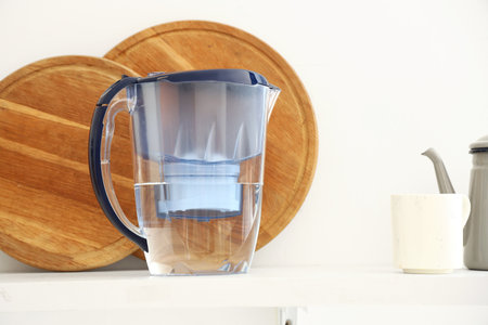 Water filter pitcher on kitchen counterの写真素材