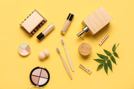 Composition with different cosmetic products and toothbrushes on color backgroundの写真素材