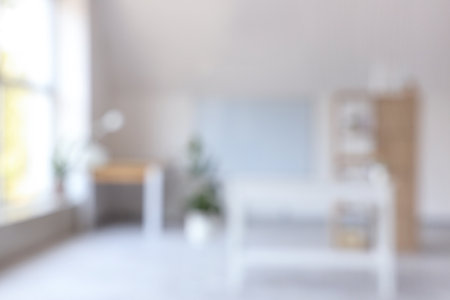 Blurred view of modern office with workplaceの写真素材