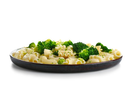 Plate of tasty pasta with broccoli on white backgroundの写真素材