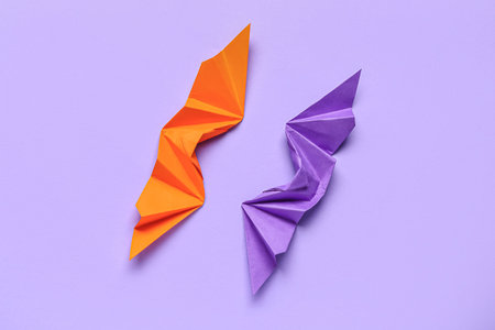 Different origami bats on purple backgroundの写真素材