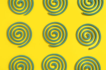 Mosquito spirals on yellow background