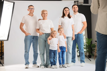 Happy family having photo shoot in studio