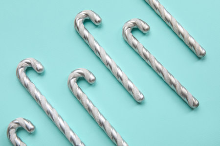 Christmas candy canes on blue backgroundの写真素材