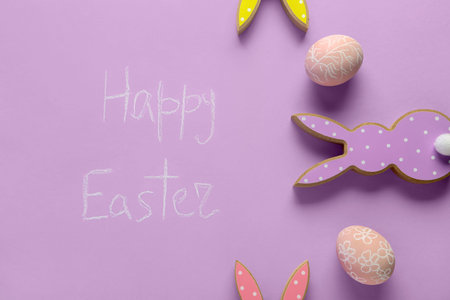 Phrase Happy Easter and festive decor on purple background
