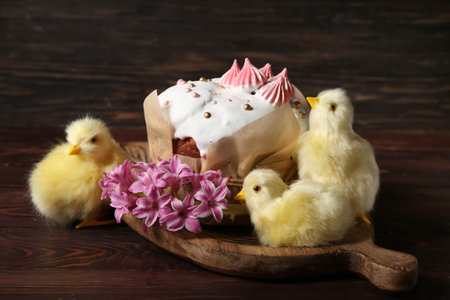 Easter cake, hyacinth and chicks on wooden tray, closeupの写真素材