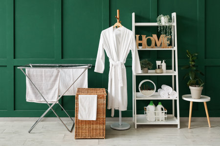 Interior of room with laundry basket, dryer and shelf unitの写真素材