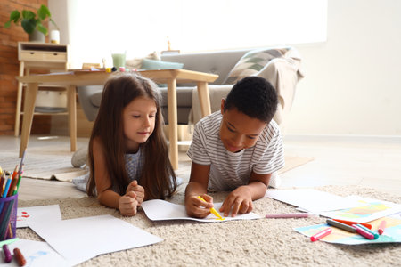 Cute little children drawing at homeの写真素材