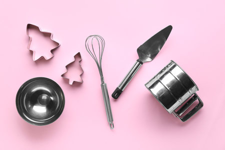 Set of utensils for preparing bakery on pink backgroundの写真素材