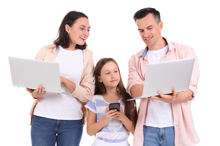 Happy family with gadgets isolated on white backgroundの写真素材