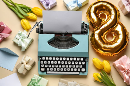 Composition with vintage typewriter, tulips and balloon for Women's Day on beige backgroundの写真素材