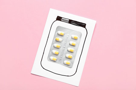 Drawn bottle and blister pack with pills on pink background