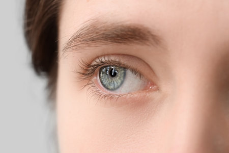 Young woman with beautiful blue eyes, closeupの写真素材