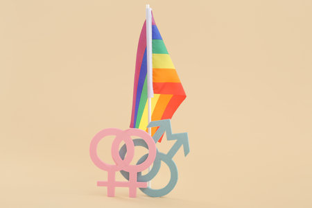 Gay and lesbian symbols with rainbow flag on beige background. LGBT conceptの写真素材