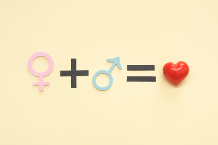 Female plus male equals love equation on beige backgroundの写真素材