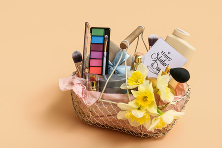 Gift basket with cosmetics and narcissus flowers for Mother's Day celebration on color backgroundの写真素材