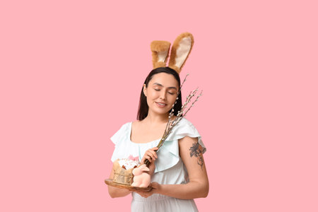 Beautiful young happy woman with shaving foam and modern epilator on blue background. Depilation conceptの写真素材