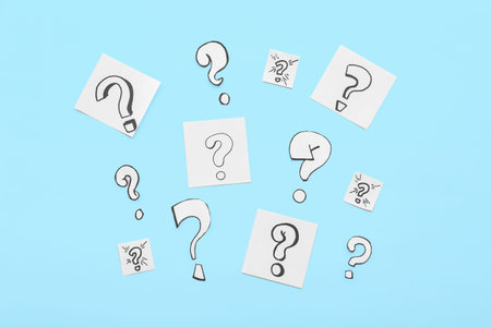 Different question marks on blue background