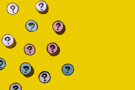 Different question marks on yellow background