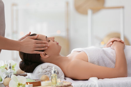 Young woman getting massage in spa salon, closeupの写真素材