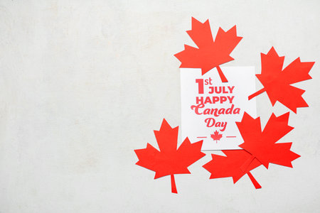 Greeting card and Maple leaves on white background. Canada Day concept