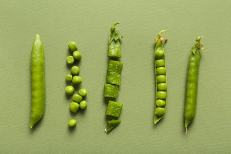 Fresh peas on green backgroundの写真素材