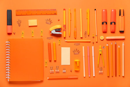 School supplies on orange background. Top viewの写真素材