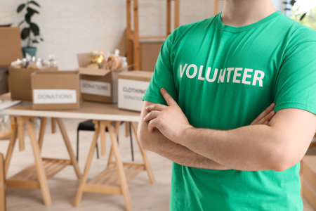 Male volunteer in center, closeupの写真素材