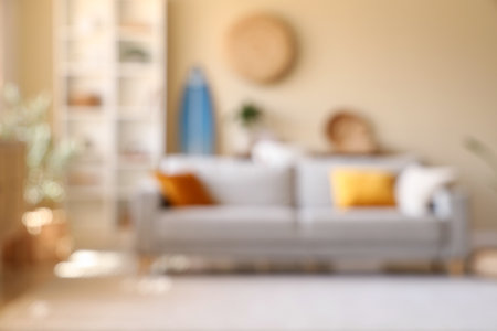 Interior of stylish modern living room with surfboard, blurred viewの写真素材