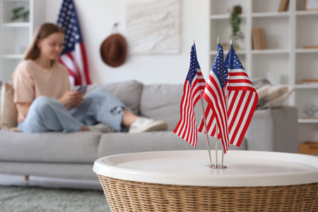 USA flags on coffee table in living room, closeupの写真素材