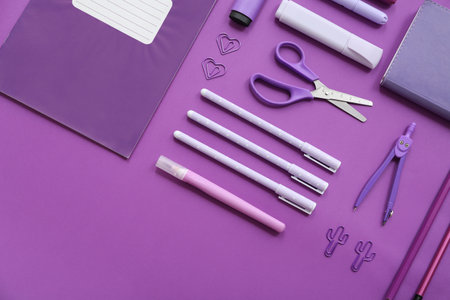 Different stationery on purple backgroundの写真素材