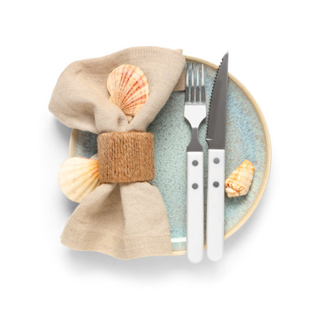 Beautiful table setting with seashells on white background