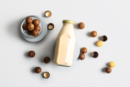 Bottle of fresh macadamia milk on gray backgroundの写真素材