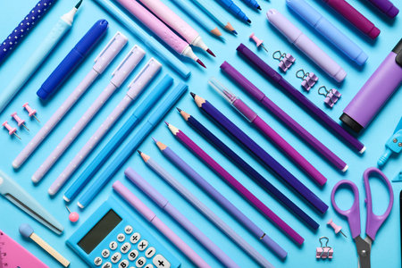 School supplies on turquoise background. Top viewの写真素材