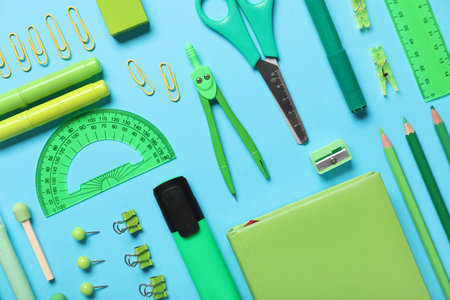 School supplies on turquoise background. Top viewの写真素材