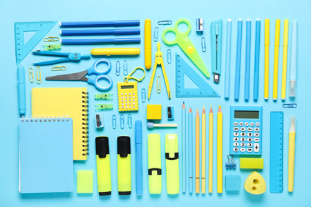 School supplies on turquoise background. Top viewの写真素材