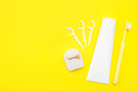 Set for oral hygiene on yellow backgroundの写真素材