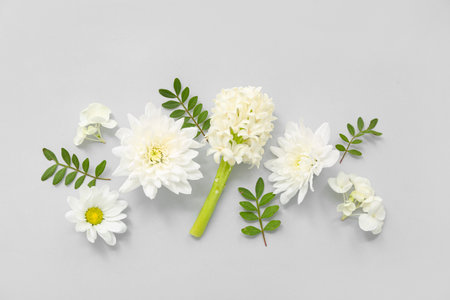 Beautiful composition with white flowers on gray backgroundの写真素材