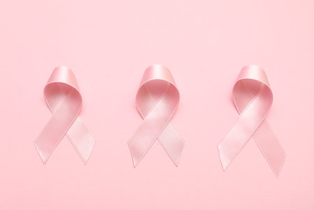 Silk ribbons on pink background. Breast cancer conceptの写真素材