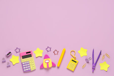 Rocket made of plasticine with stationery on lilac background. Top viewの写真素材