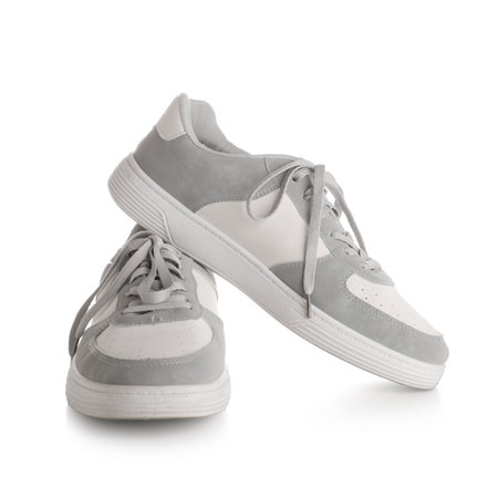 Stylish male sneakers on white backgroundの写真素材