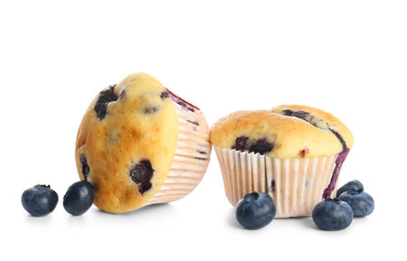 Tasty blueberry muffins on white background, closeupの写真素材