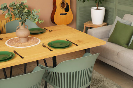 Stylish table setting in dining roomの写真素材